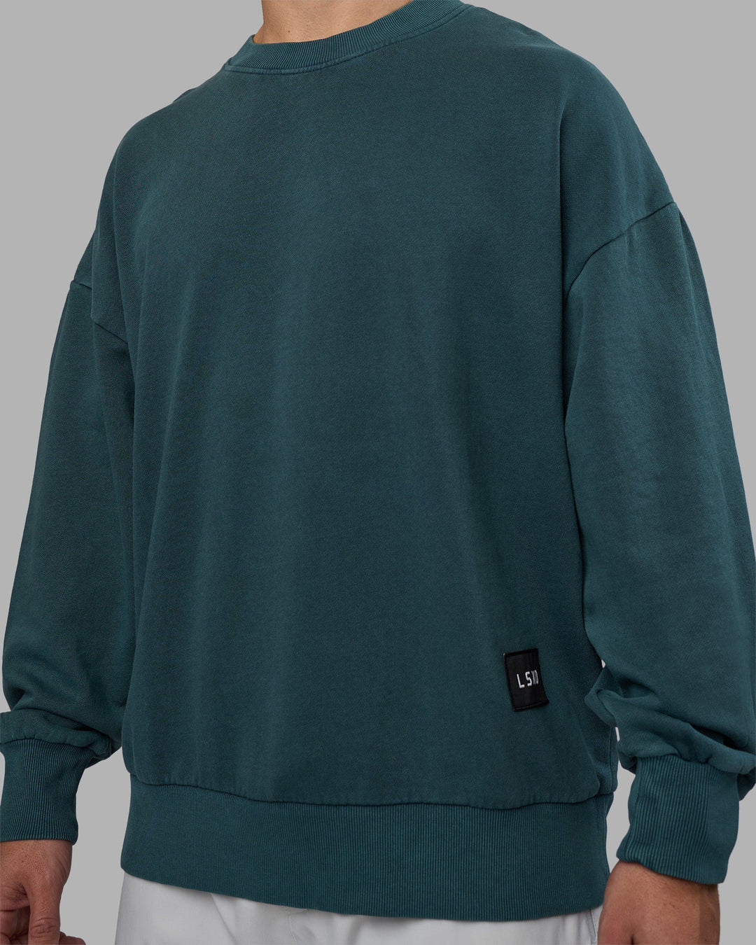 Man wearing Segmented Oversized Sweater - Abyssal | Model:Jaiden | Size:M