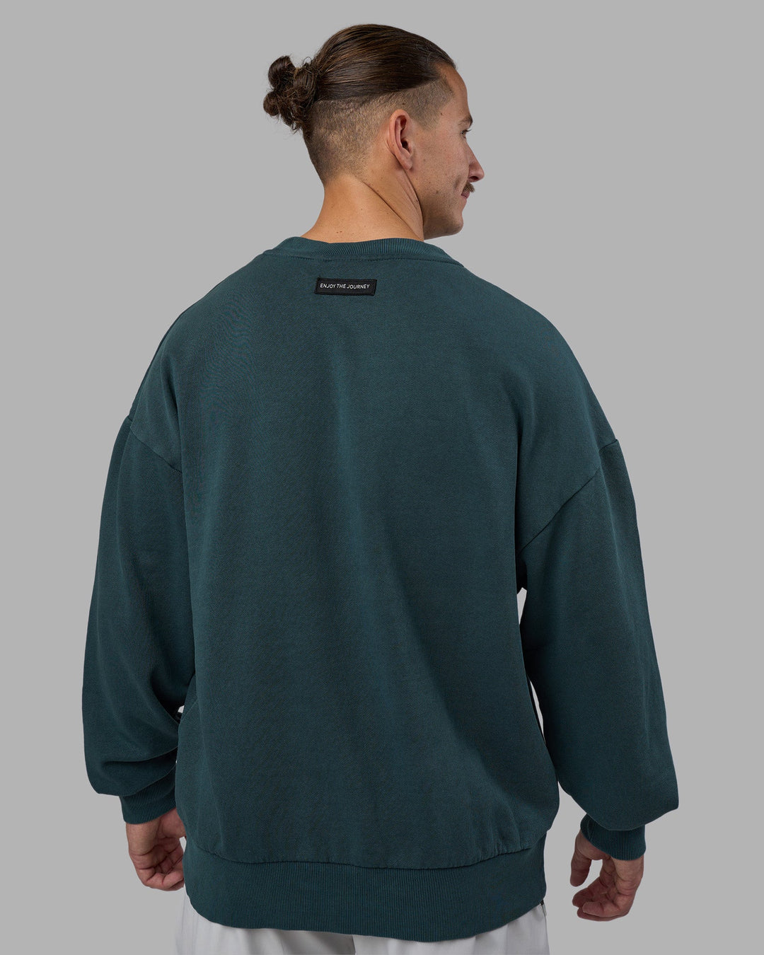 Man wearing Segmented Oversized Sweater - Abyssal | Model:Jaiden | Size:M