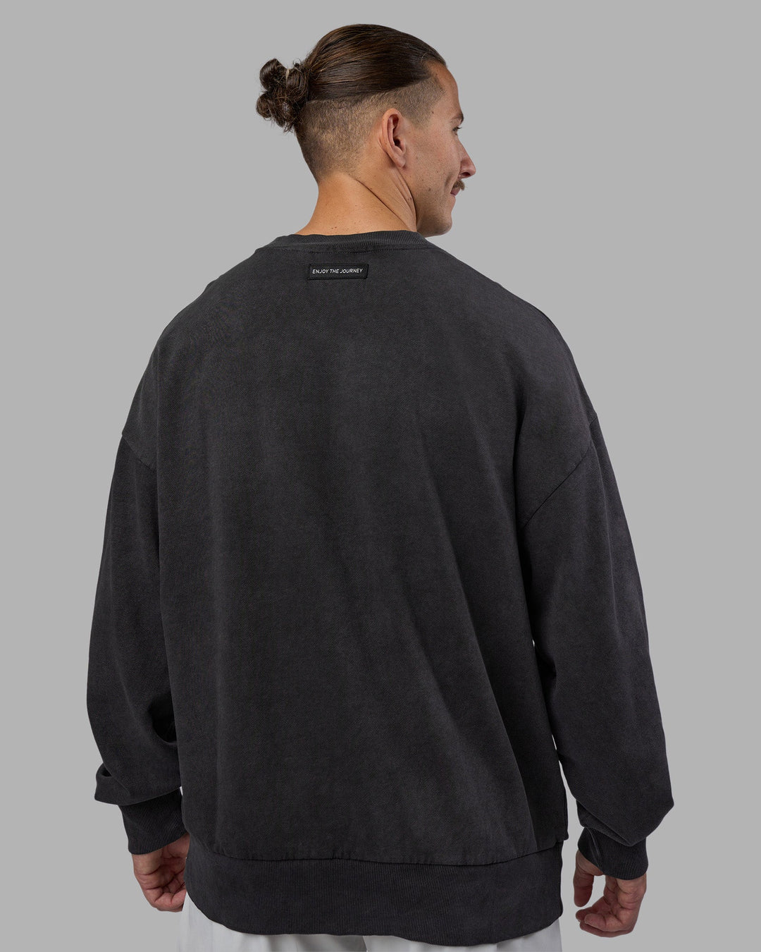 Man wearing Segmented Oversized Sweater - Black Washed | Model:Jaiden | Size:M