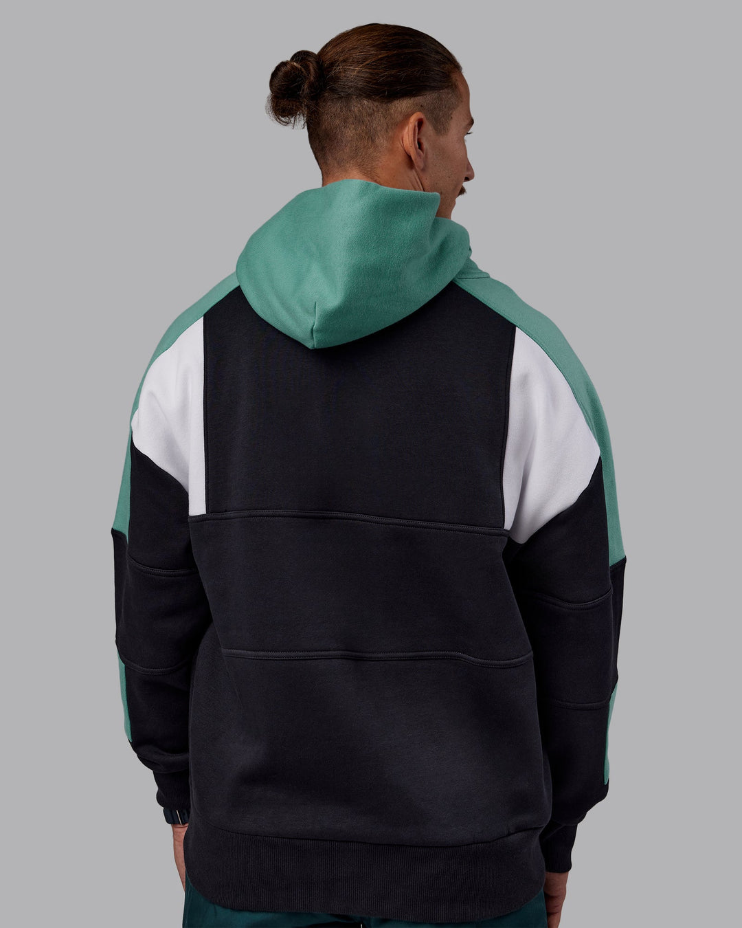 Man wearing Slam Oversized Hoodie - Caviar-Agate Green | Model:Jaiden | Size:M