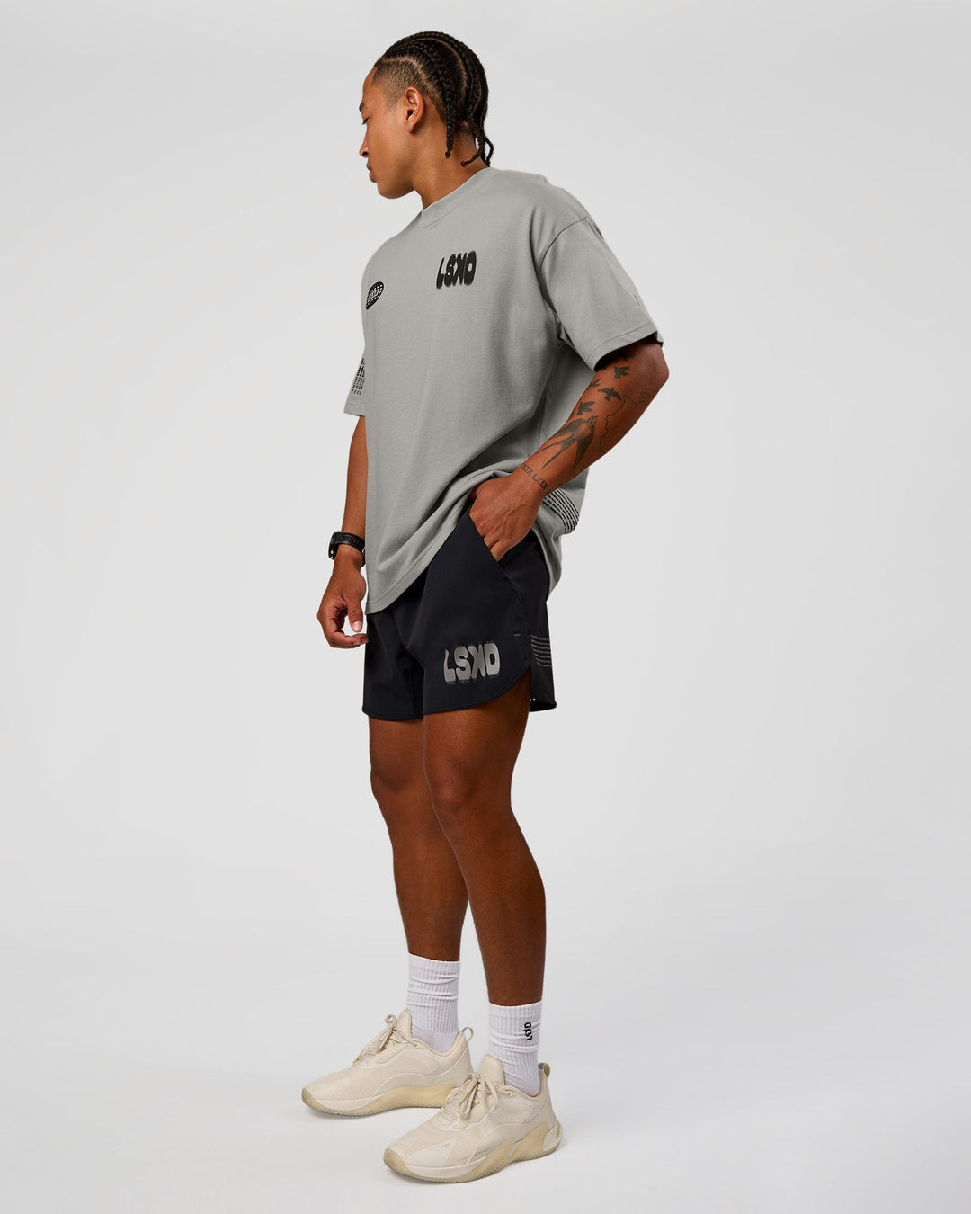 Man wearing Static Grit Heavyweight Oversized Tee - Alloy-Black | Model:Malebo | Size:M