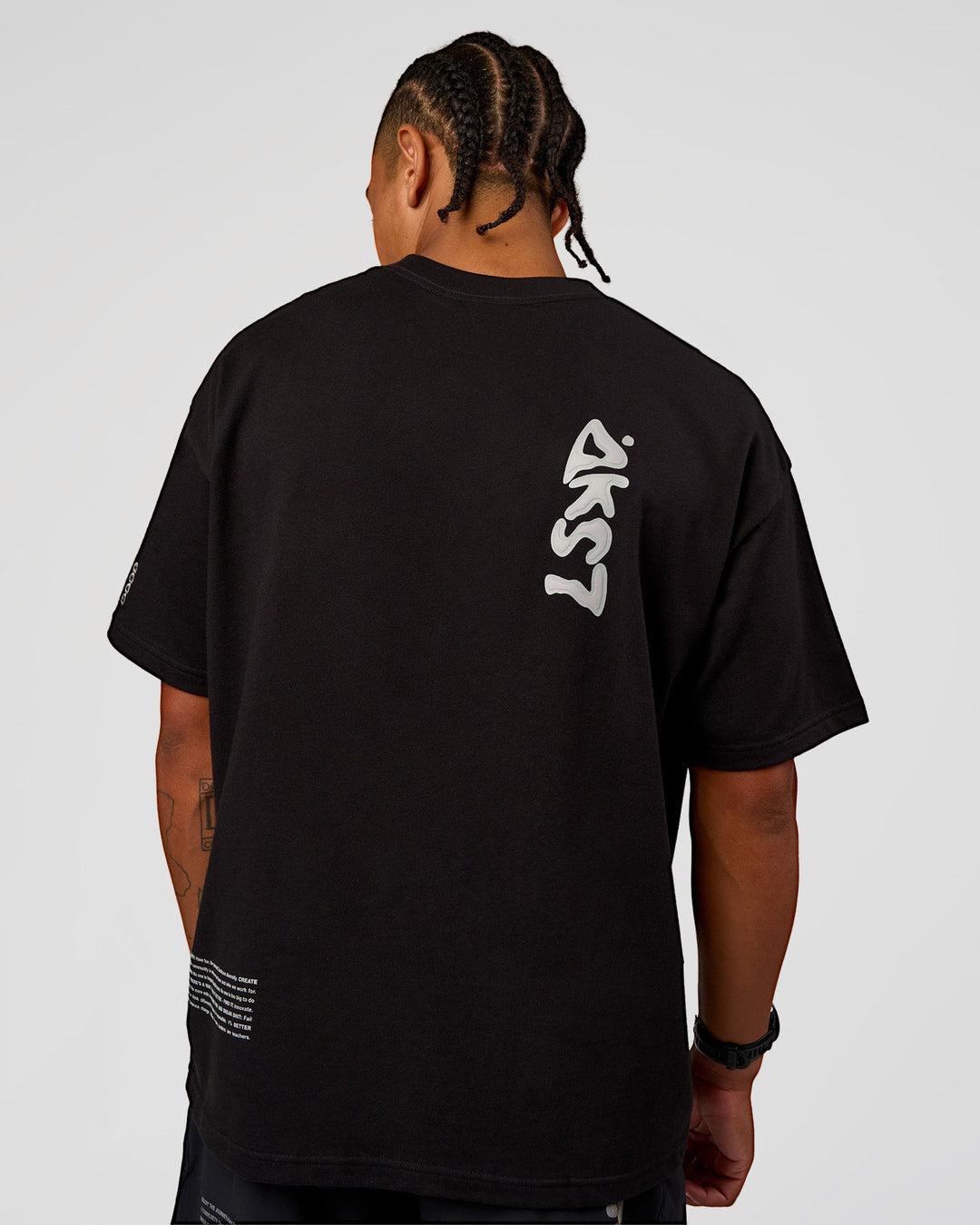 Man wearing Static Grit Heavyweight Oversized Tee - Black-Alloy | Model:Malebo | Size:M
