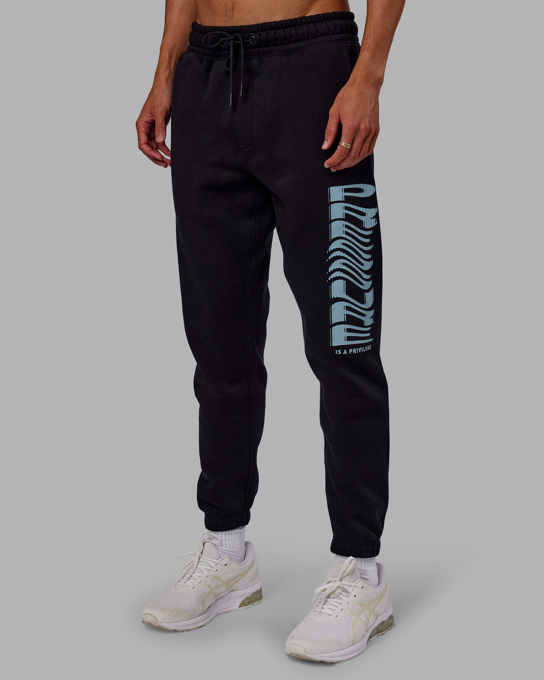 Man wearing Static Track Pant - Black-Skyride | Model:Jaxon | Size:M