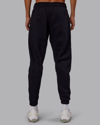 Man wearing Static Track Pant - Black-Skyride | Model:Jaxon | Size:M