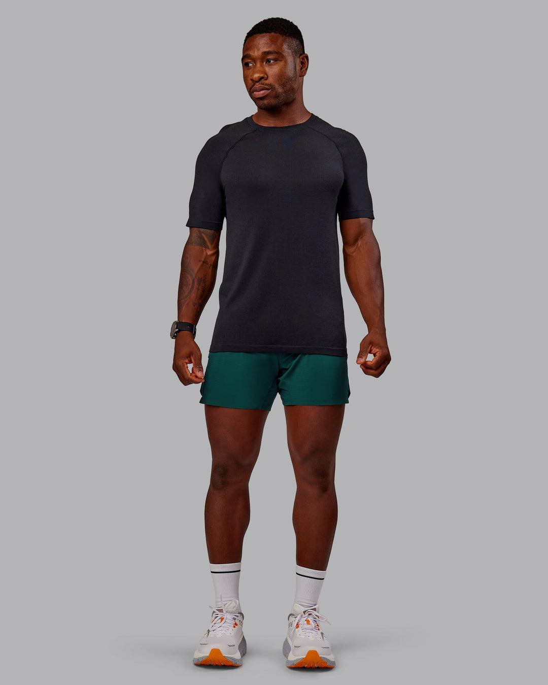 Man wearing UltraAir 5&quot; Lined Performance Short in Dark Moss | Size:M