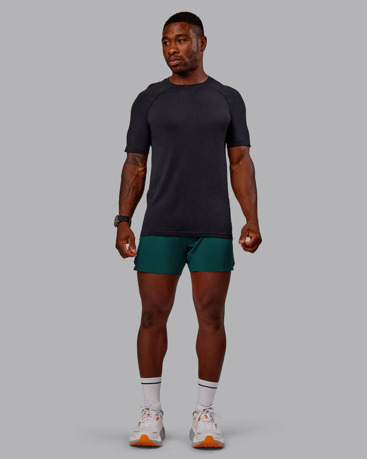 Man wearing UltraAir 5&quot; Lined Performance Short in Dark Moss | Size:M
