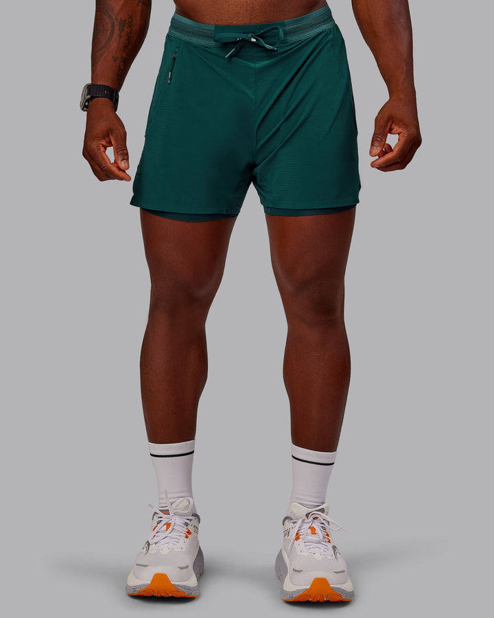 Man wearing UltraAir 5&quot; Lined Performance Short in Dark Moss | Size:M
