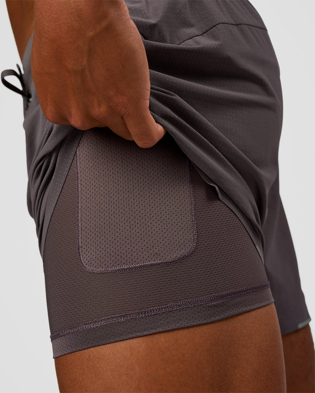 Man wearing UltraAir 5" Lined Performance Short - Duskstone | Model:Malebo | Size:M