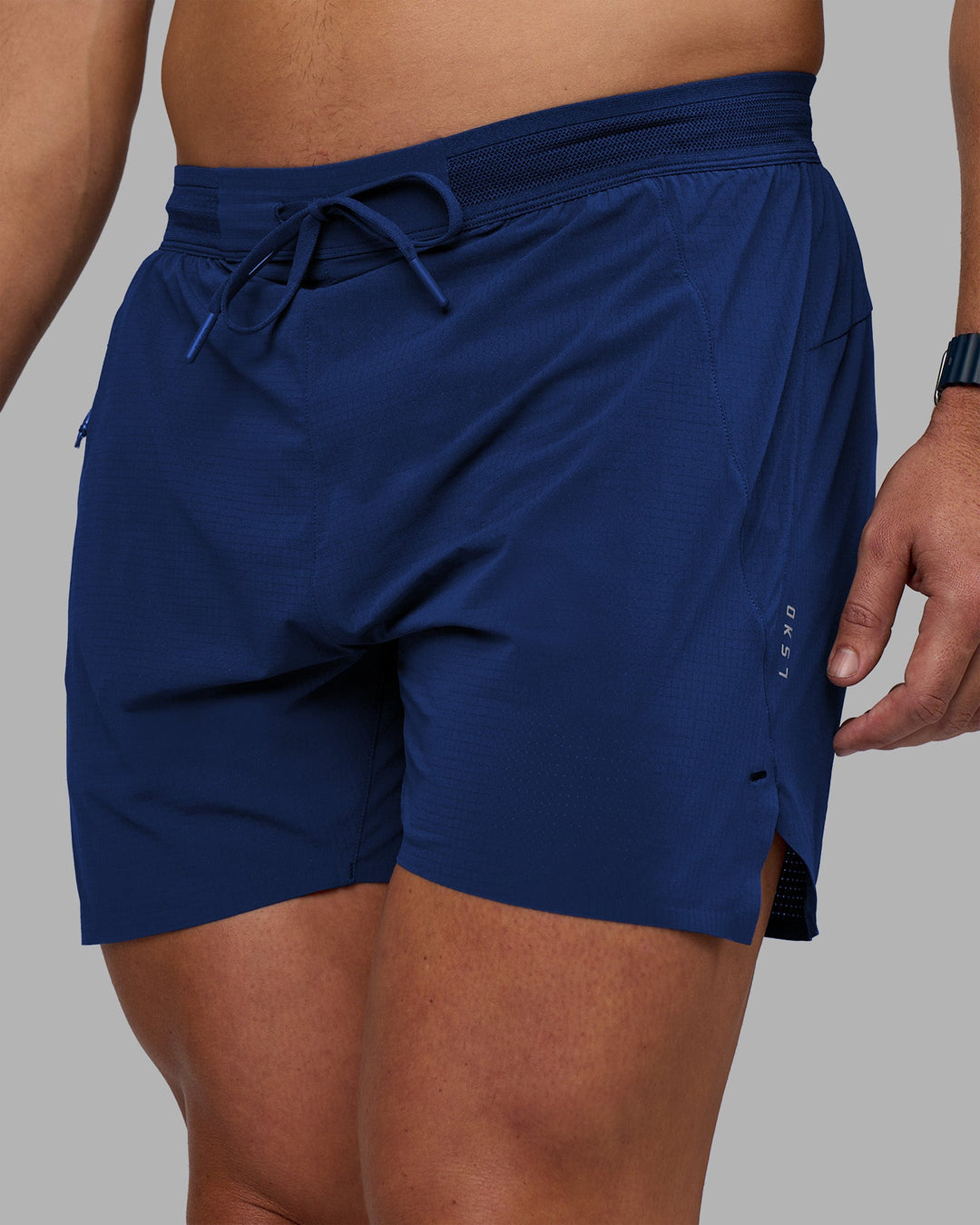 Man wearing UltraAir 5&quot; Lined Performance Short - Midnight Blue | Model:Jaiden | Size:M