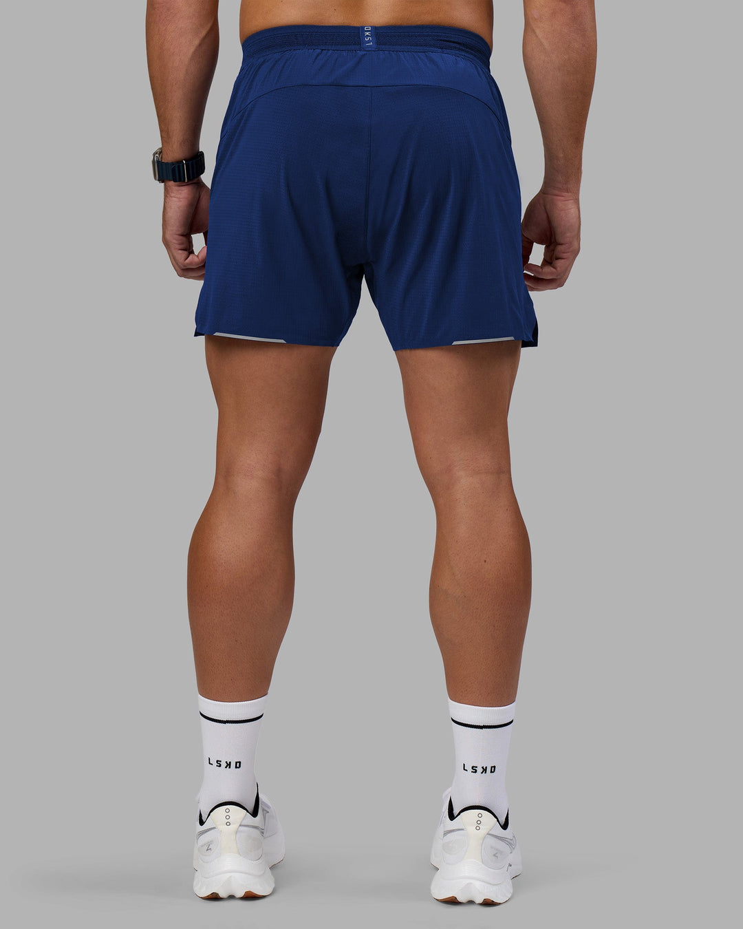 Man wearing UltraAir 5&quot; Lined Performance Short - Midnight Blue | Model:Jaiden | Size:M