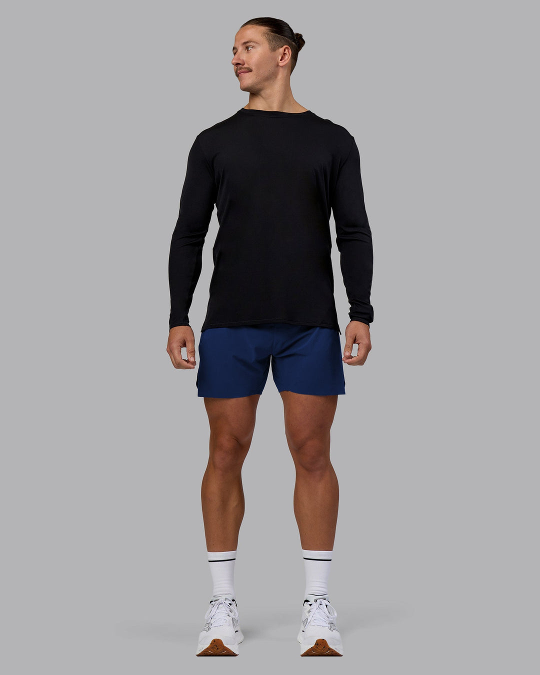 Man wearing UltraAir 5&quot; Lined Performance Short - Midnight Blue | Model:Jaiden | Size:M