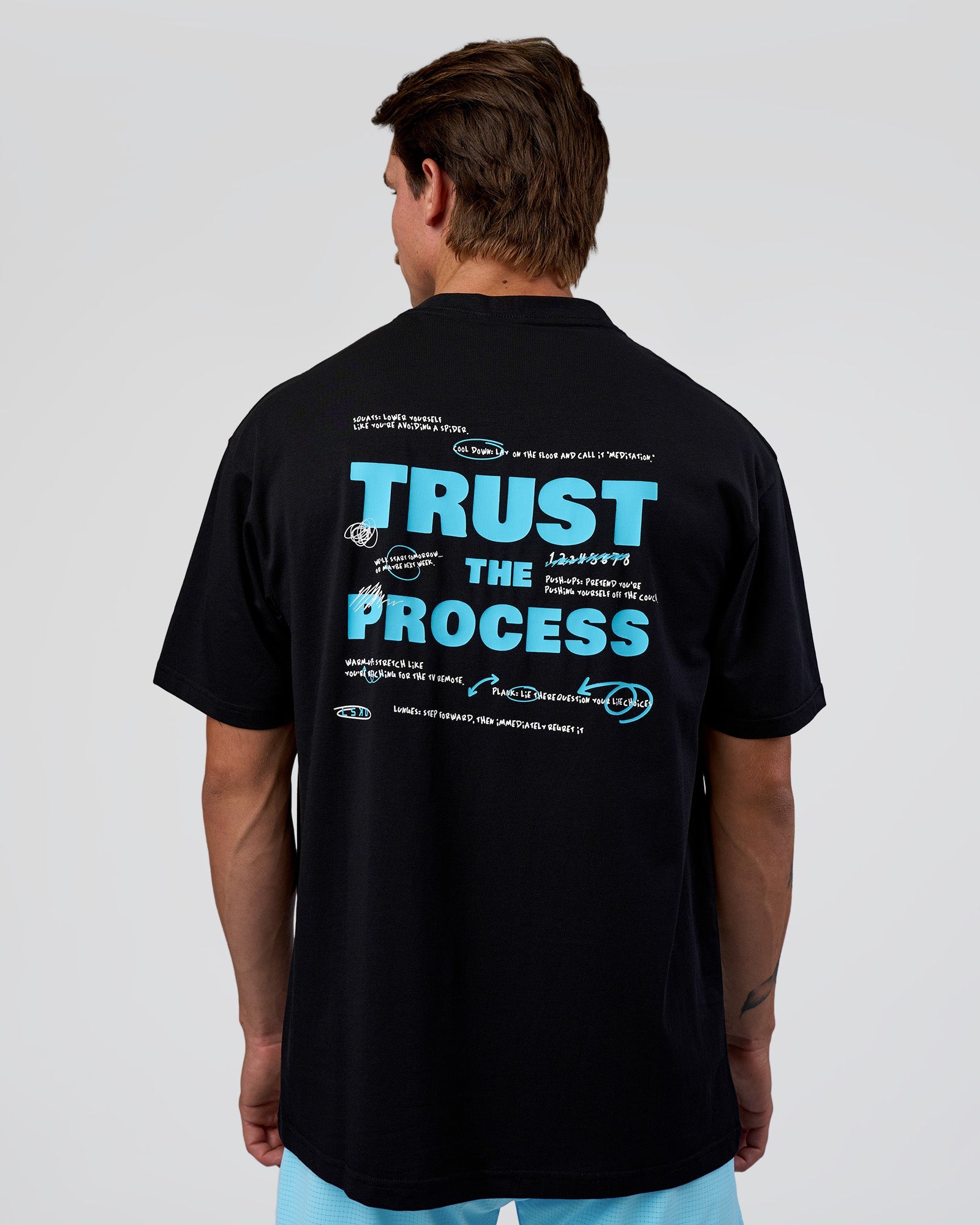 Man wearing Unfit Club FLXCotton Oversized Tee - Black-White | Model:Konnor | Size:M