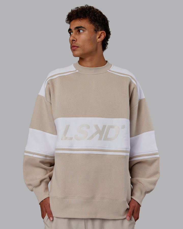 Man wearing A-Team Sweater Oversize - Shale Beige-White | Model:Jaxon | Size:M
