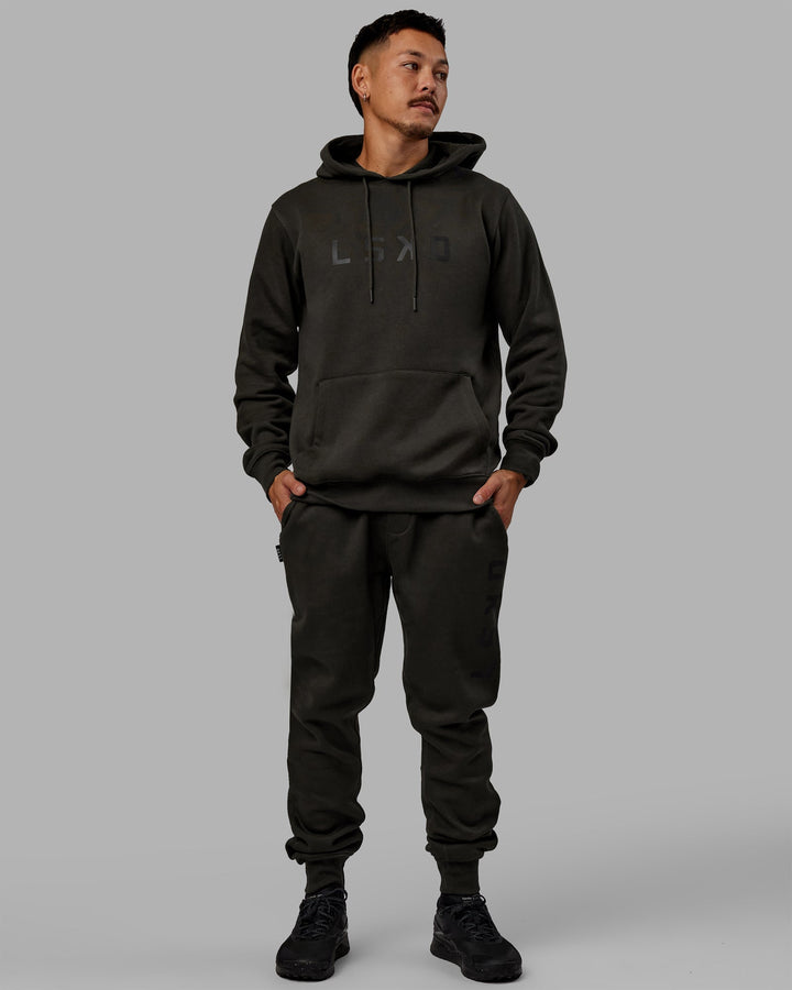 Man wearing Unisex Structure Hoodie - Pirate Black-Black
