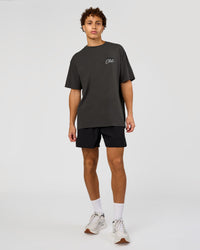 Man wearing Values Run Club FLXCotton Tee - Dark Storm-Alloy | Model:Leandro | Size:M