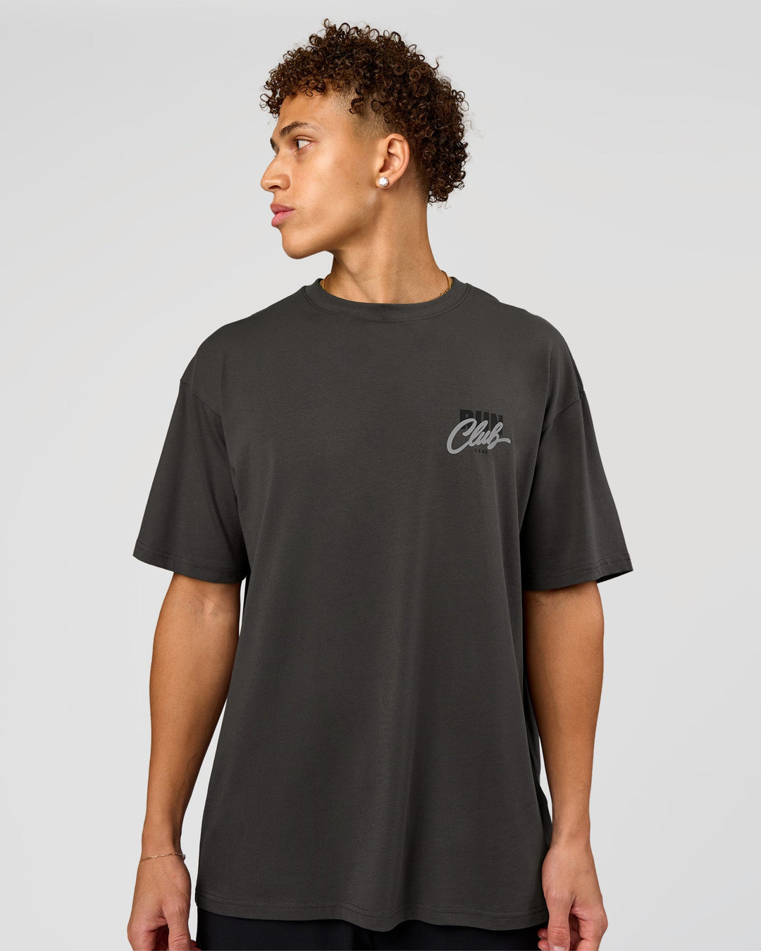 Man wearing Values Run Club FLXCotton Tee - Dark Storm-Alloy | Model:Leandro | Size:M