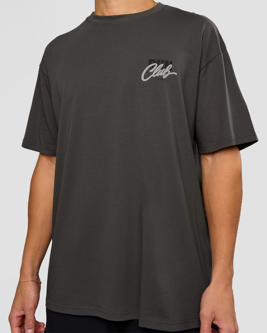 Man wearing Values Run Club FLXCotton Tee - Dark Storm-Alloy | Model:Leandro | Size:M