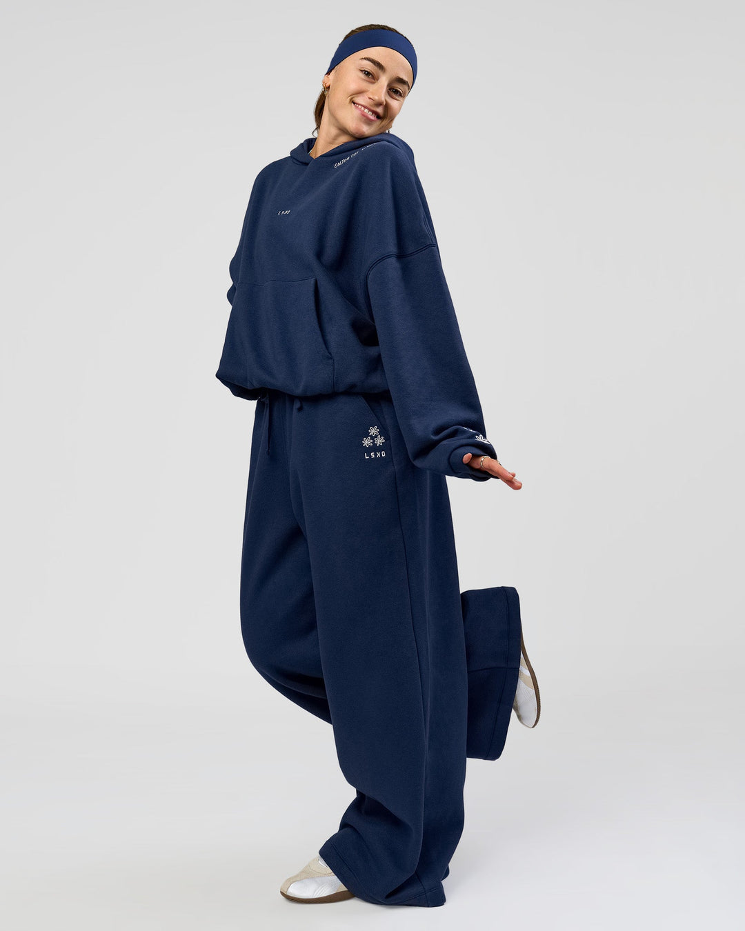 Woman wearing Zola Oversized Hoodie - Future Navy | Model:Grace | Size:M