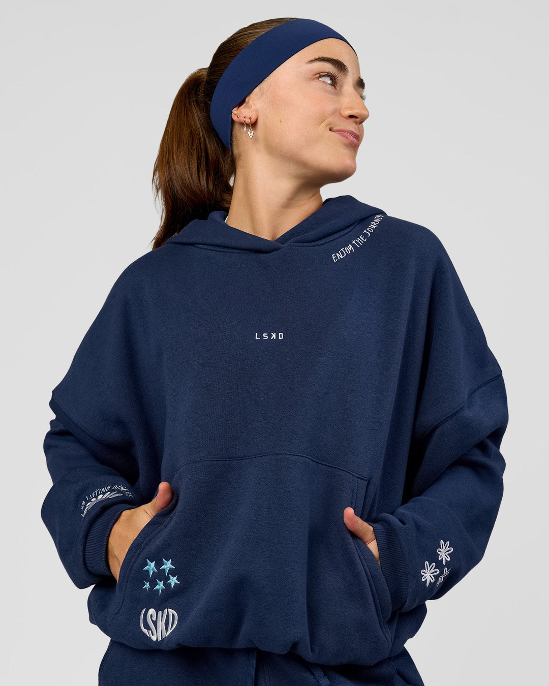 Woman wearing Zola Oversized Hoodie - Future Navy | Model:Grace | Size:M