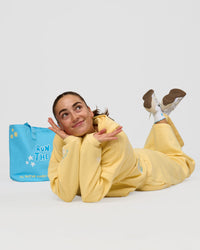 Woman wearing Zola Oversized Hoodie - Lemon | Model:Grace | Size:M