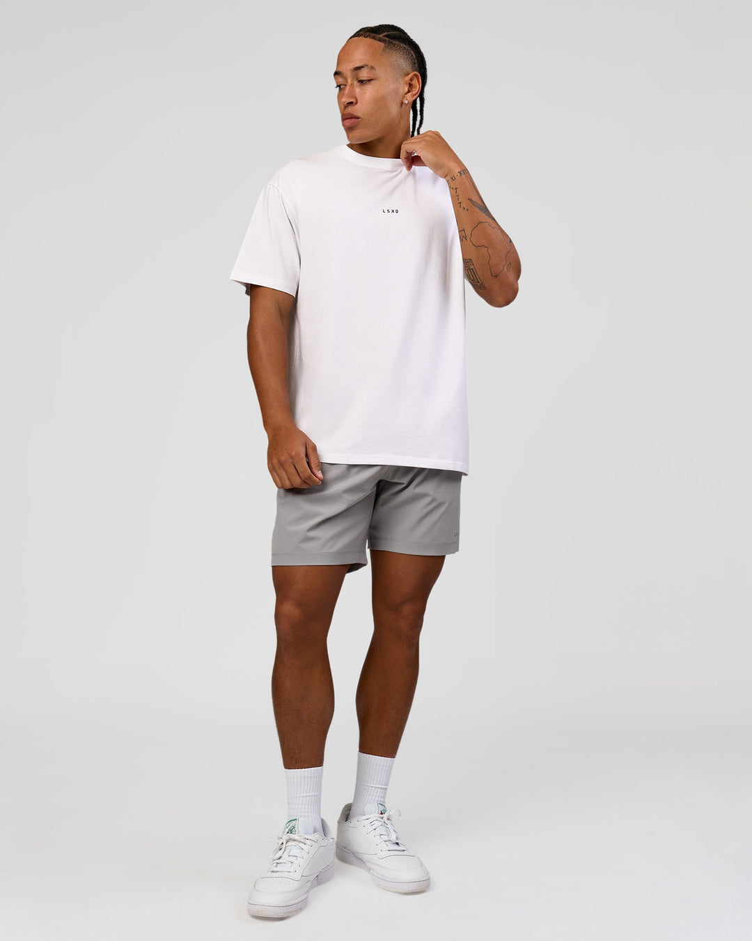 Man wearing Woman wearing Run Like The Wind FLXCotton Oversized Tee - White-Future Navy | Model:Malebo | Size:M