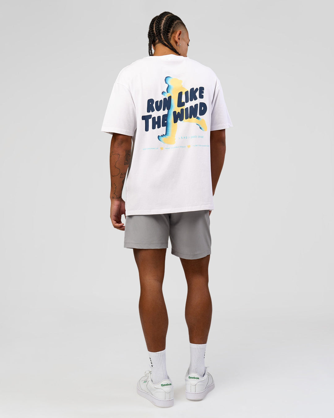 Man wearing Woman wearing Run Like The Wind FLXCotton Oversized Tee - White-Future Navy | Model:Malebo | Size:M