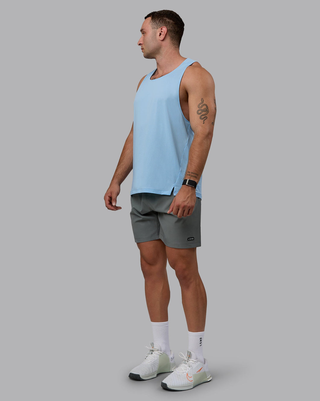 Man wearing Pace Running Tank - Glacial Blue