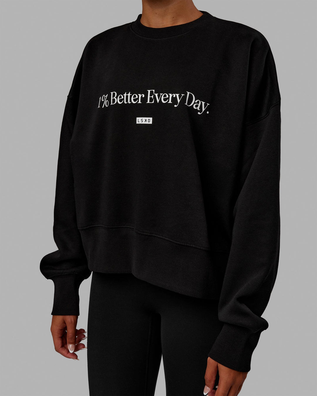 Woman wearing 1% Better Heavyweight Sweater - Black-White