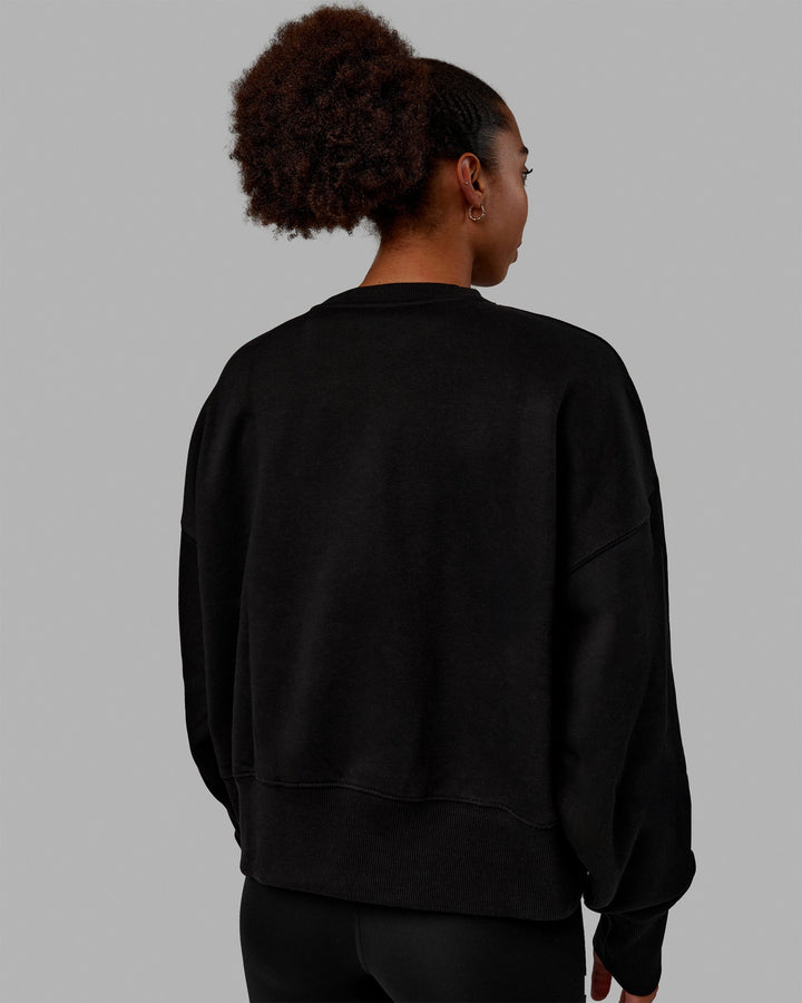 Woman wearing 1% Better Heavyweight Sweater - Black-White
