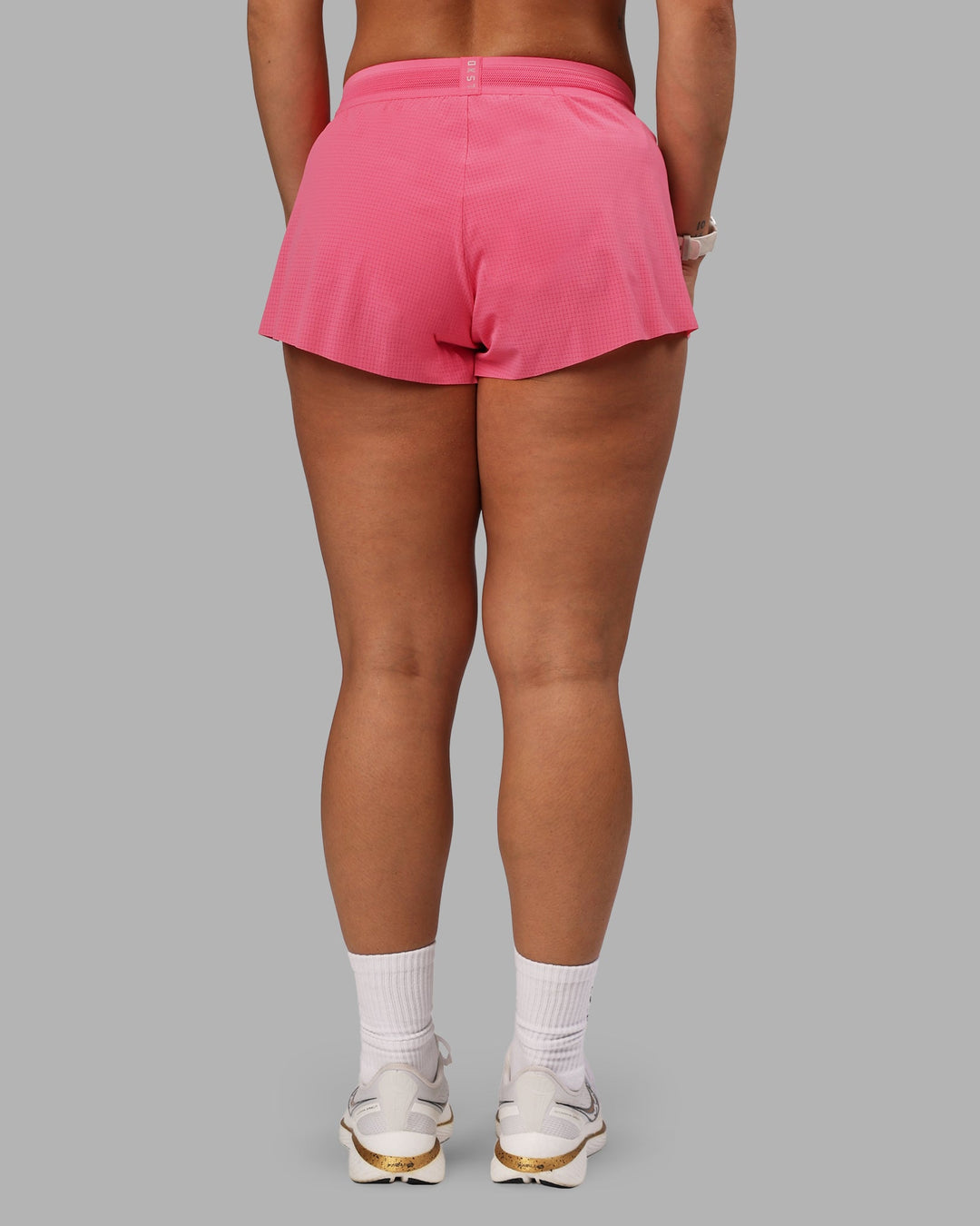 Woman wearing Accelerate 3&quot; Run Shorts - Pink Lemonade