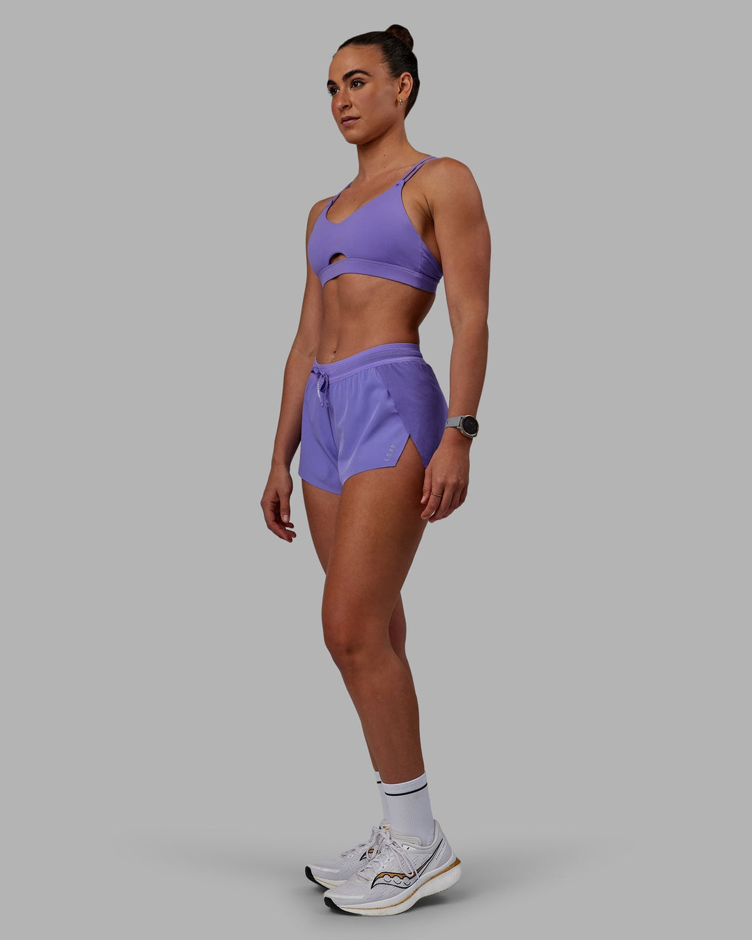 Woman wearing Accelerate Run Shorts - Dahlia Purple