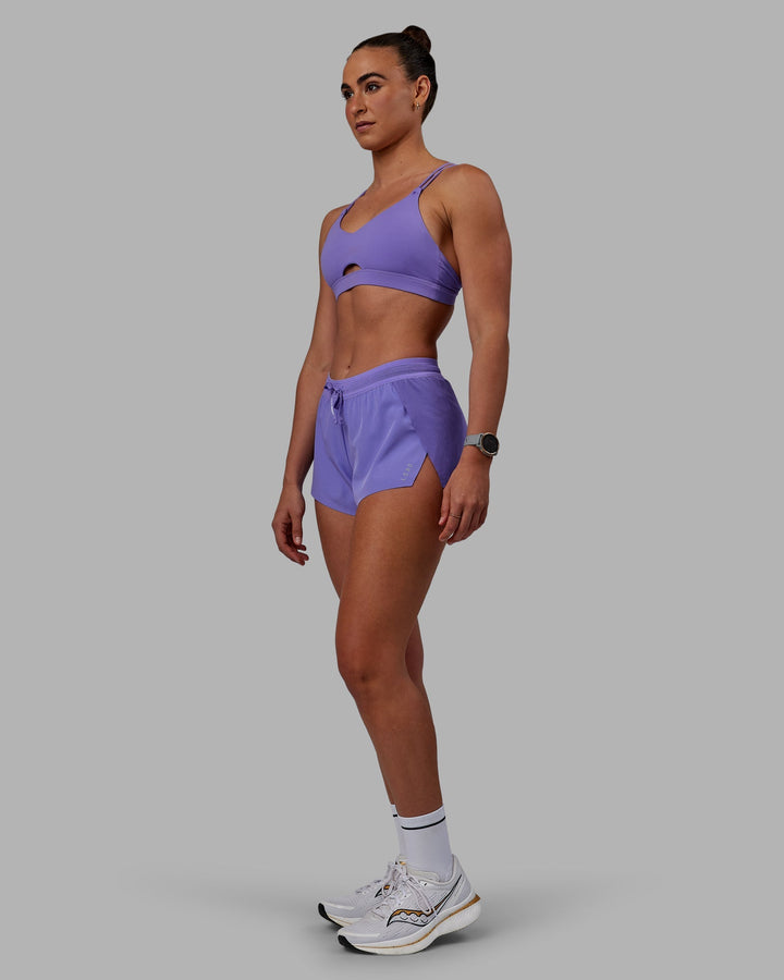 Woman wearing Accelerate Run Shorts - Dahlia Purple
