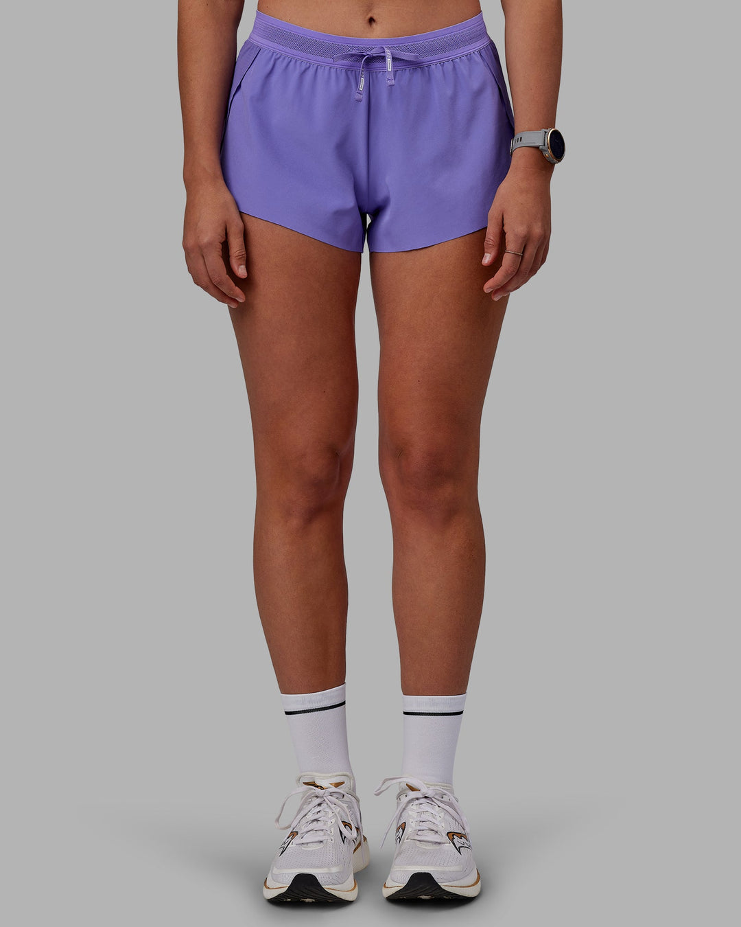 Woman wearing Accelerate Run Shorts - Dahlia Purple