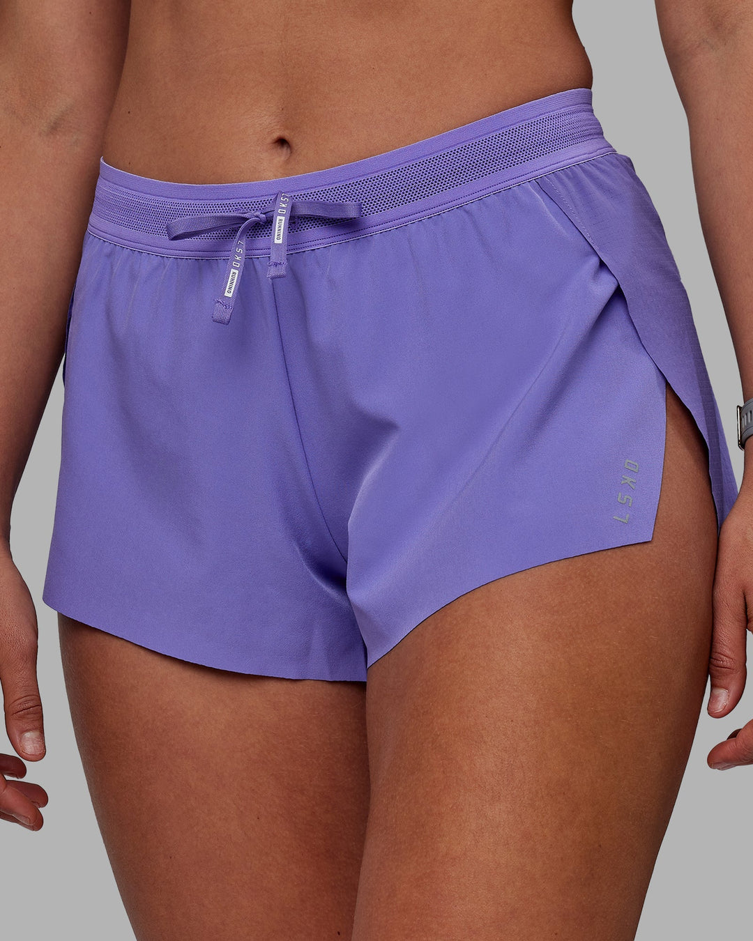 Woman wearing Accelerate Run Shorts - Dahlia Purple