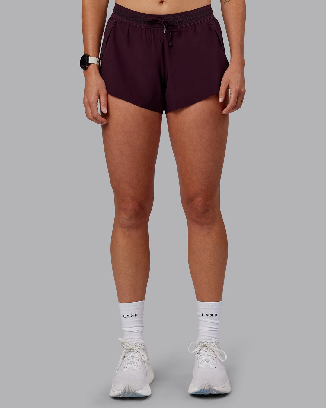 Woman wearing Accelerate 3&quot; Run Shorts - Mulberry