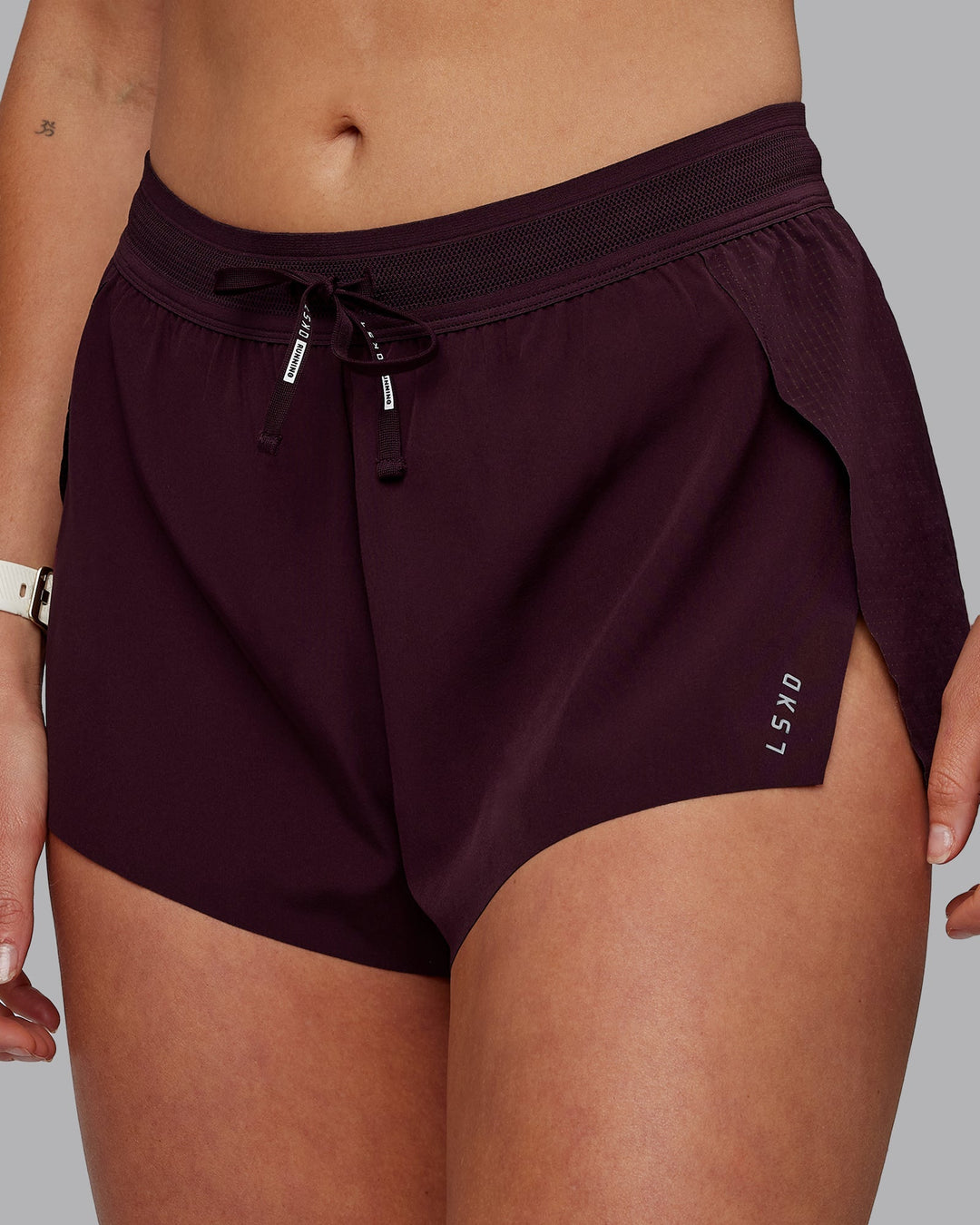 Woman wearing Accelerate 3&quot; Run Shorts - Mulberry