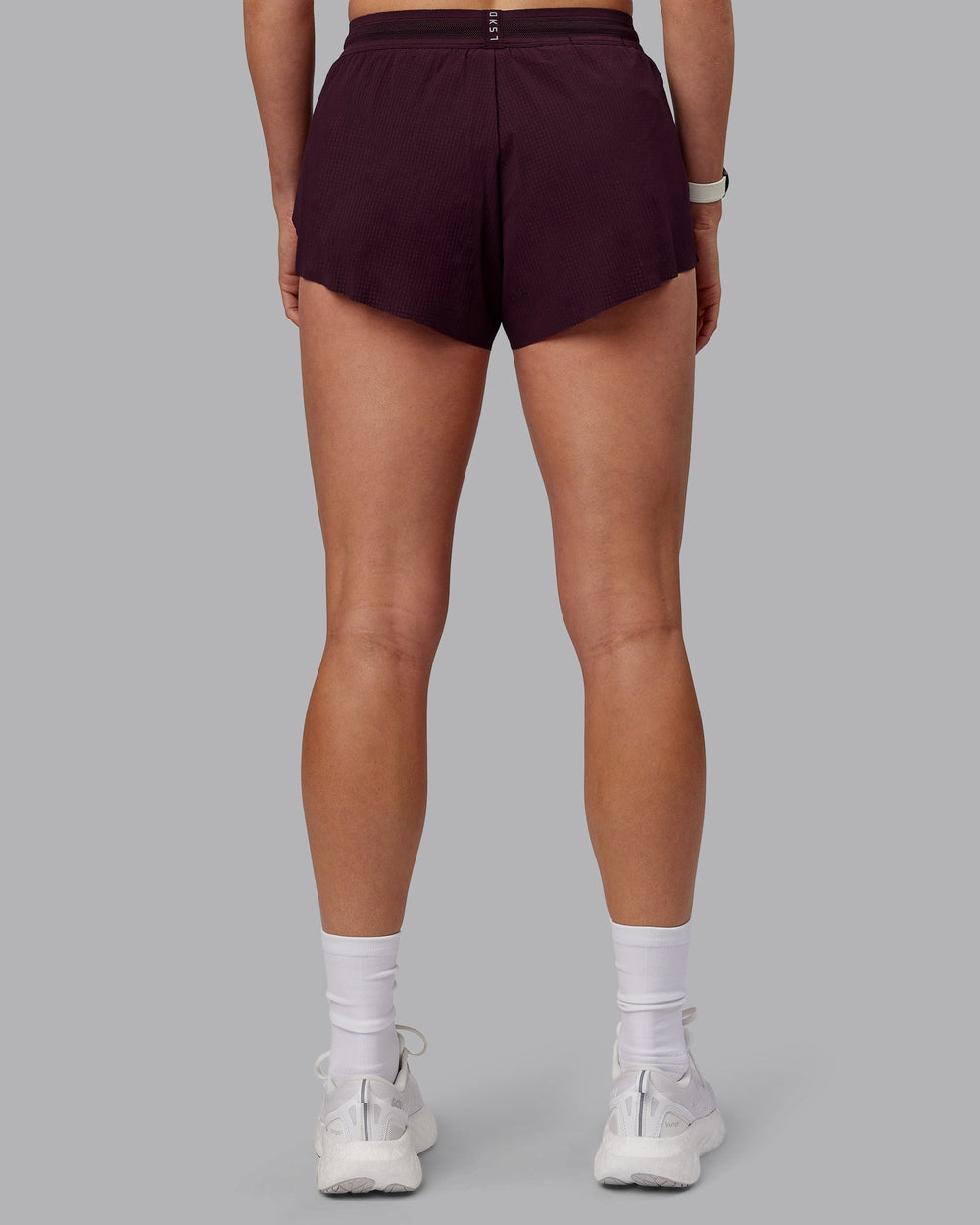 Woman wearing Accelerate 3" Run Shorts - Mulberry