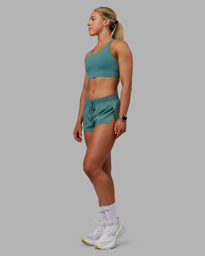 Woman wearing Accelerate Sports Bra - Sagebrush
