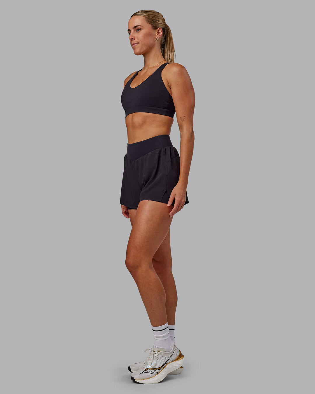 Woman wearing Agility 3&quot; Lined Run Shorts - Black