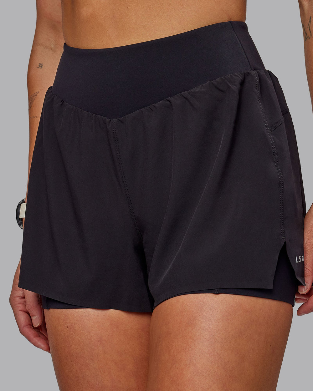 Woman wearing Agility 3" Lined Run Shorts - Black