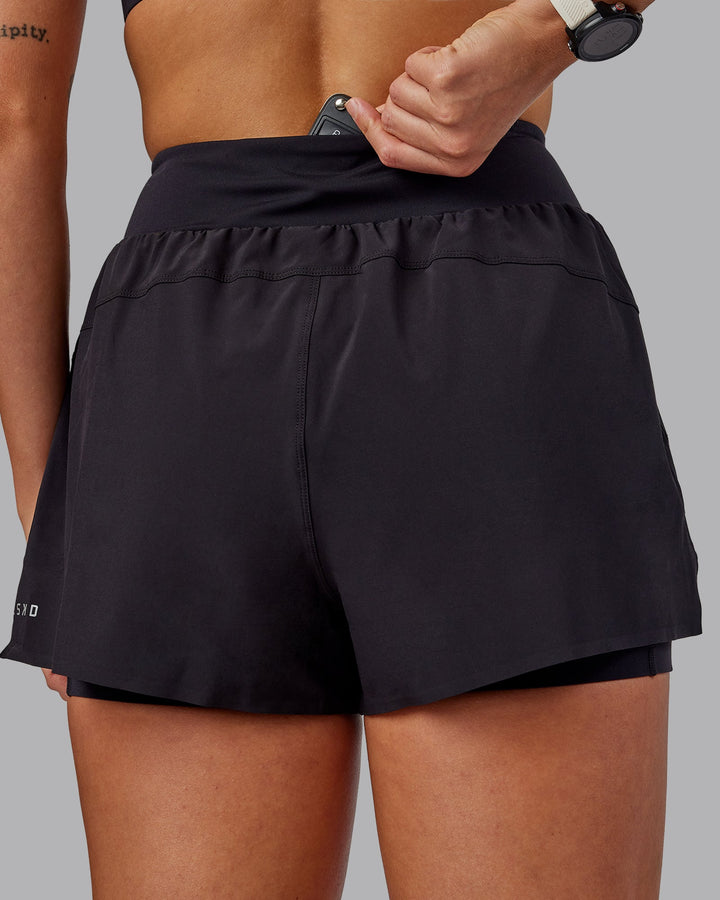 Woman wearing Agility 3&quot; Lined Run Shorts - Black
