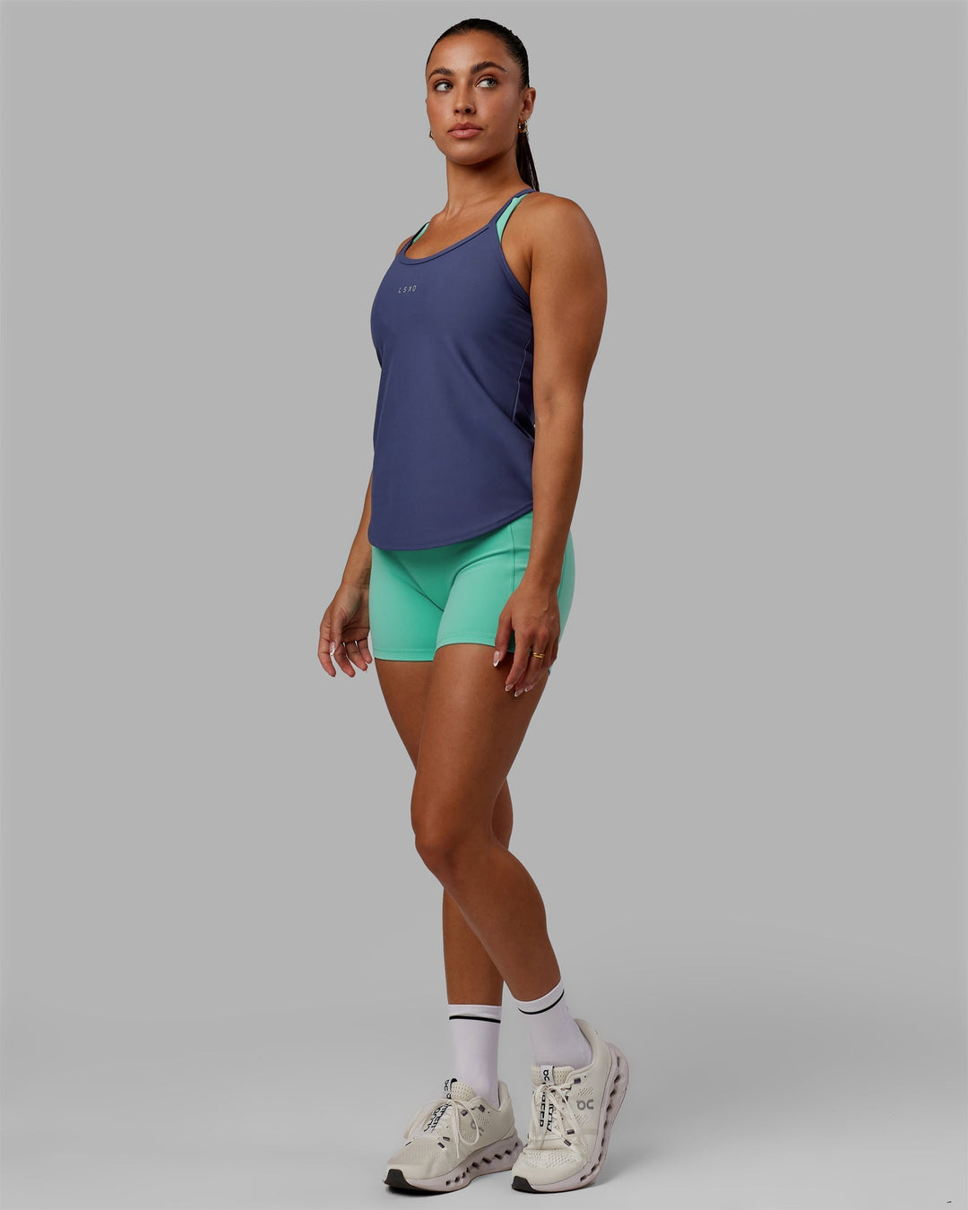 Woman wearing Agility Active Tank - Future Dusk