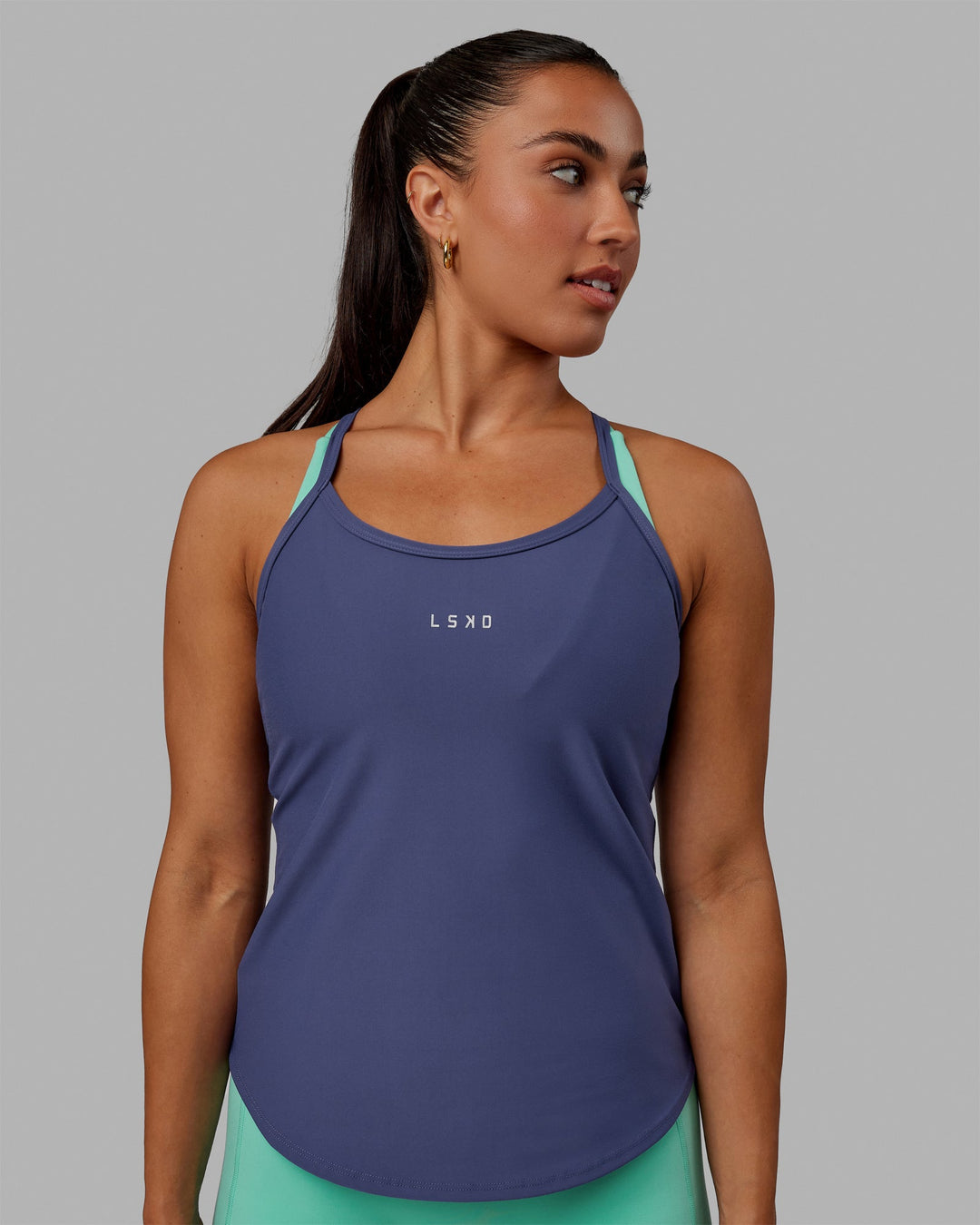 Woman wearing Agility Active Tank - Future Dusk