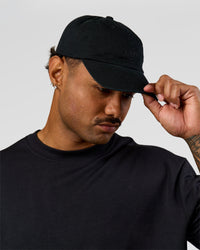 Man wearing All Day Cap in Black | Thumbnail Index: 4
