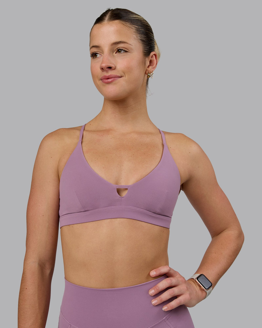 Woman wearing Ascend Sports Bra - Grape