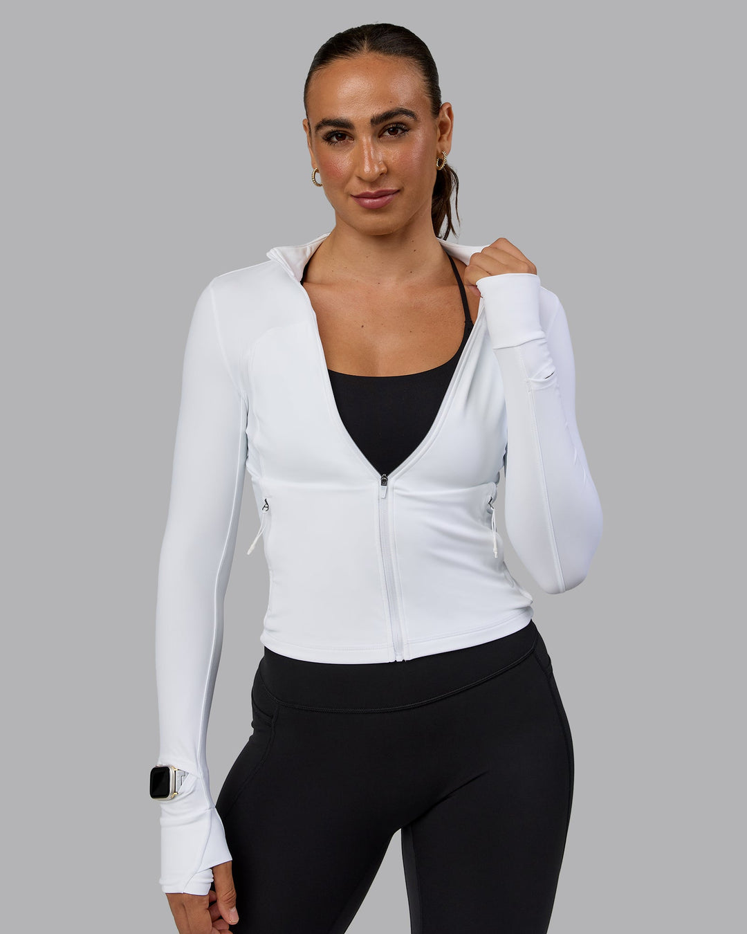 Woman wearing Aspire Jacket - White