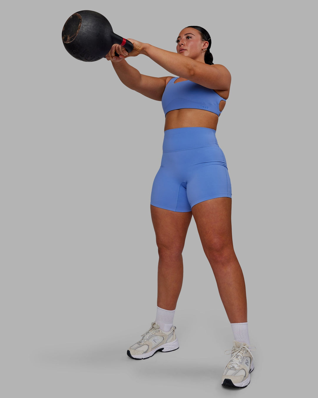 Woman wearing Aspire Sports Bra - Ultramarine