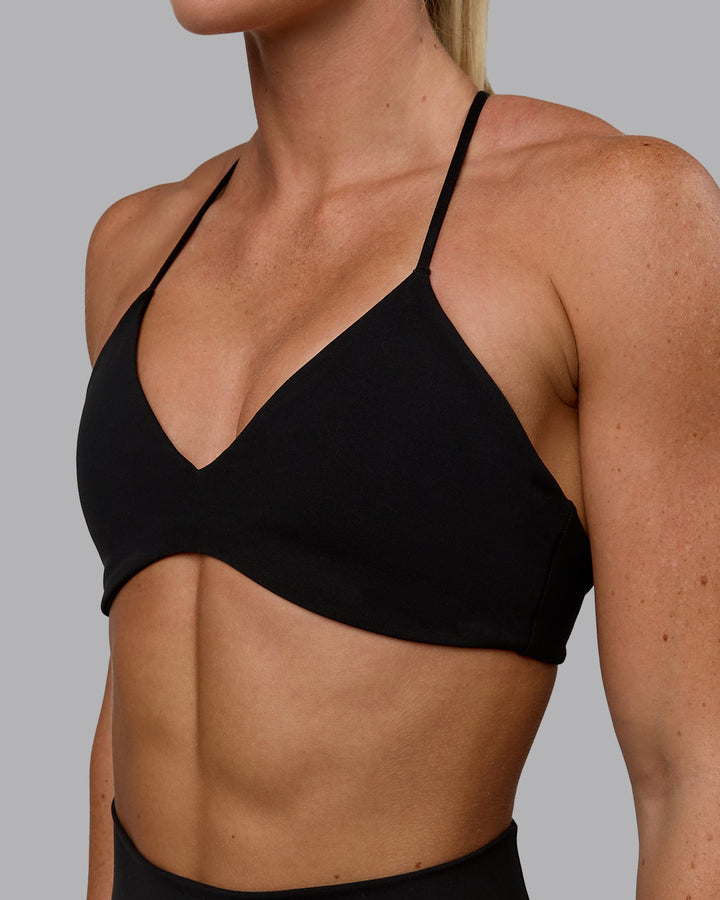 Woman wearing Aura Sports Bra - Black
