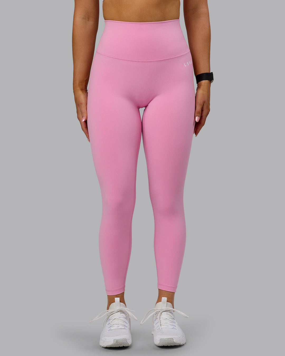 Woman wearing Base 2.0 7/8 Length Tights - Bubblegum