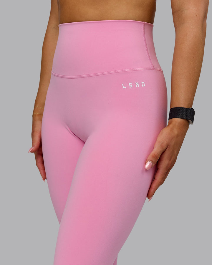 Woman wearing Base 2.0 7/8 Length Tights - Bubblegum
